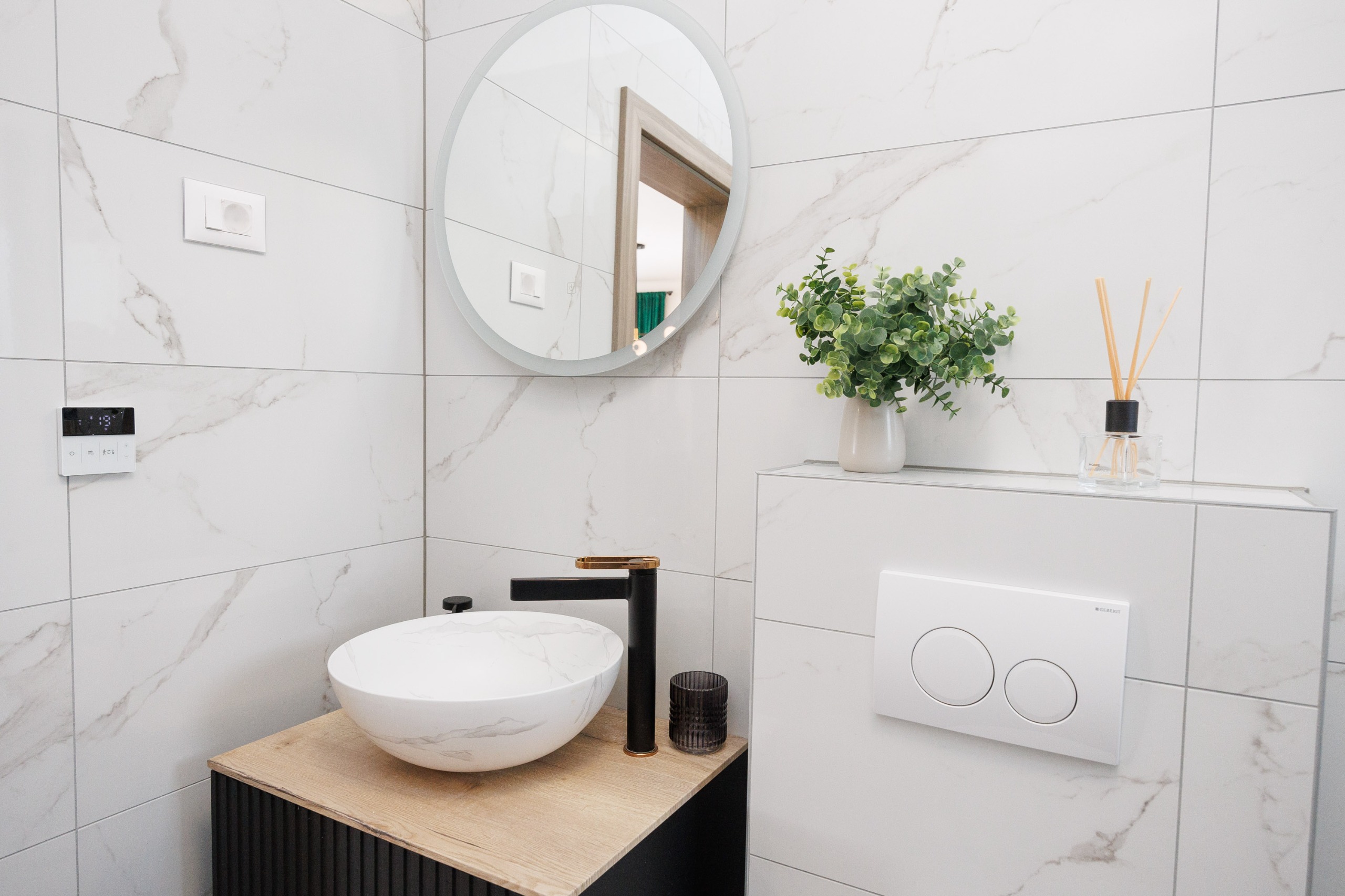 Marble vanity with vessel sink