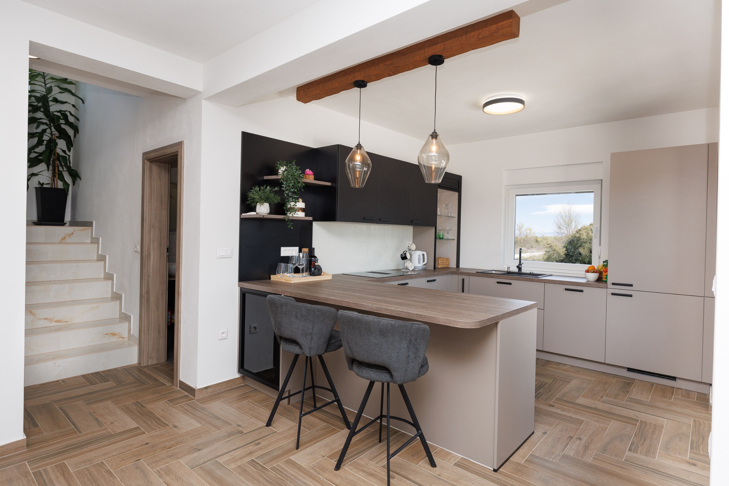 Kitchen island with bar stools