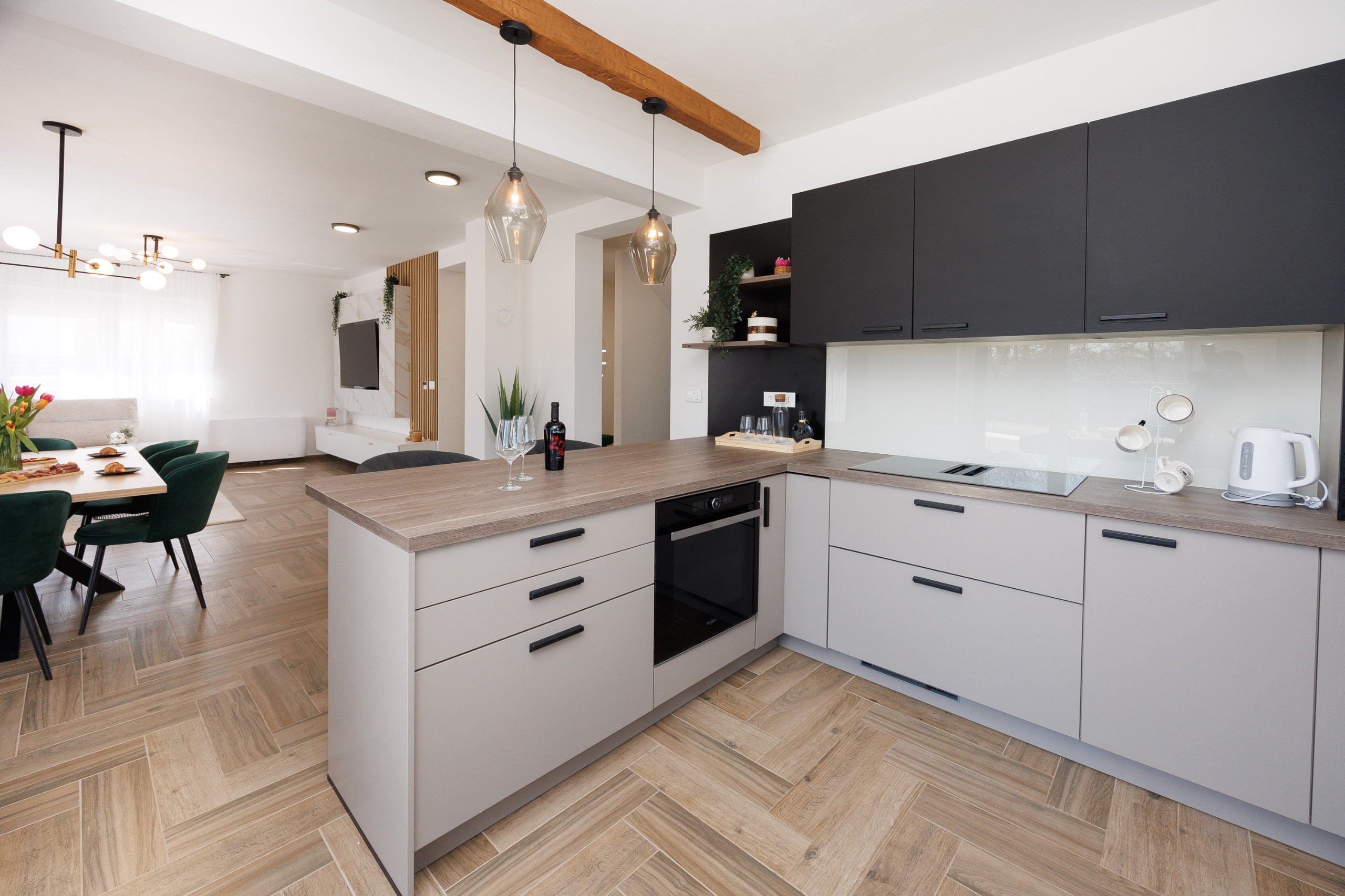 Kitchen wide view with living area
