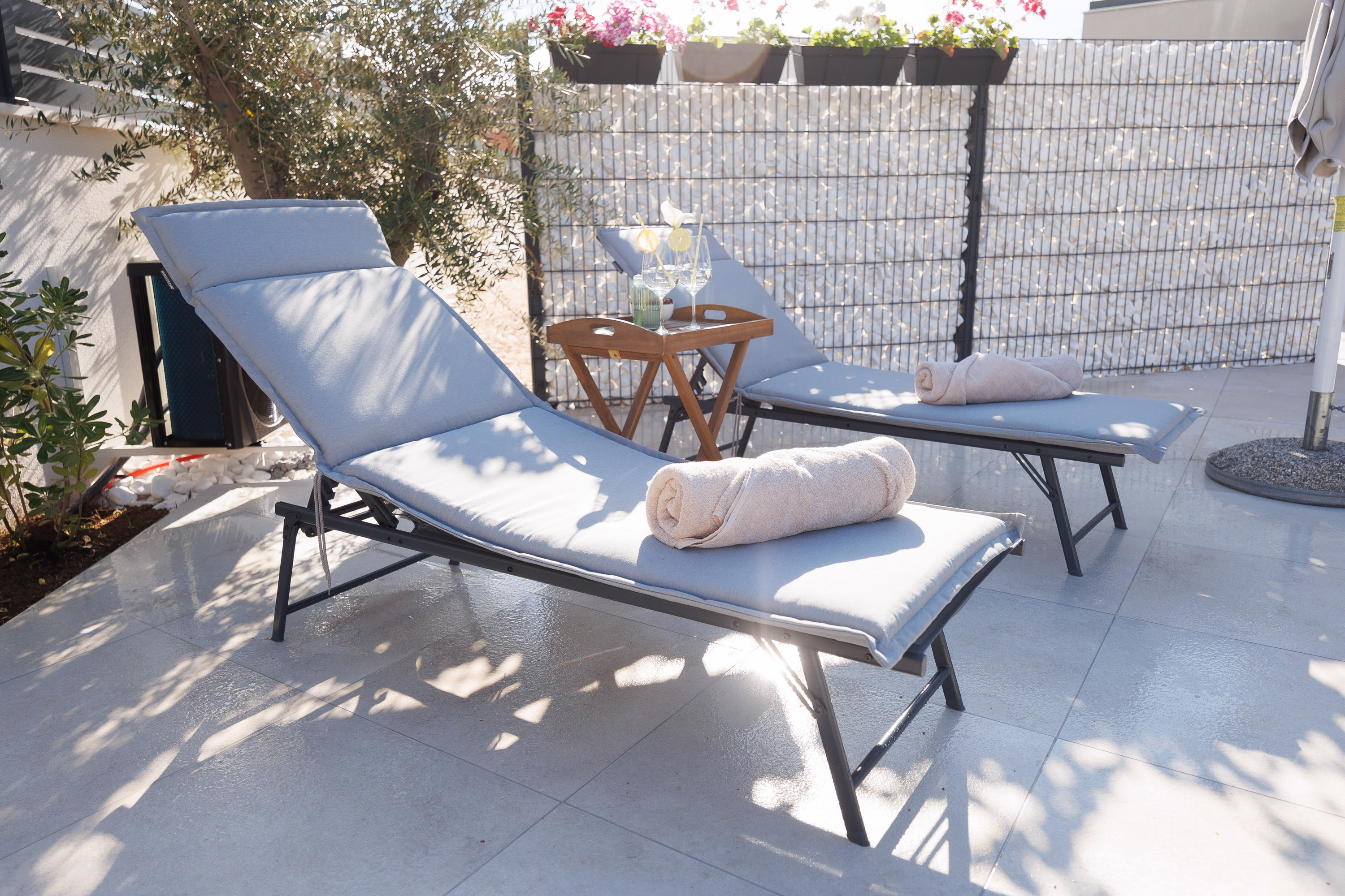 Loungers with refreshments tray