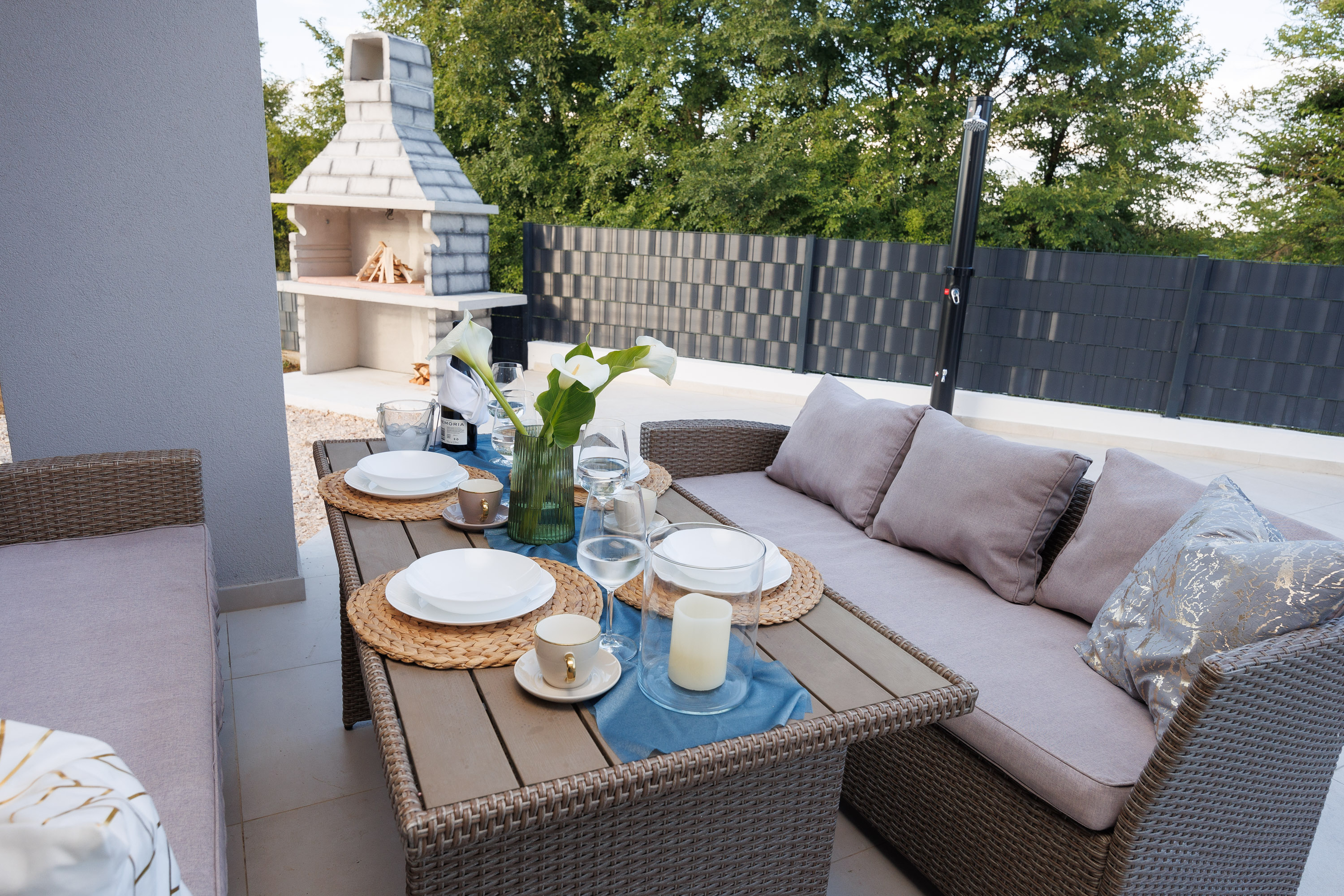 Outdoor dining with stone grill