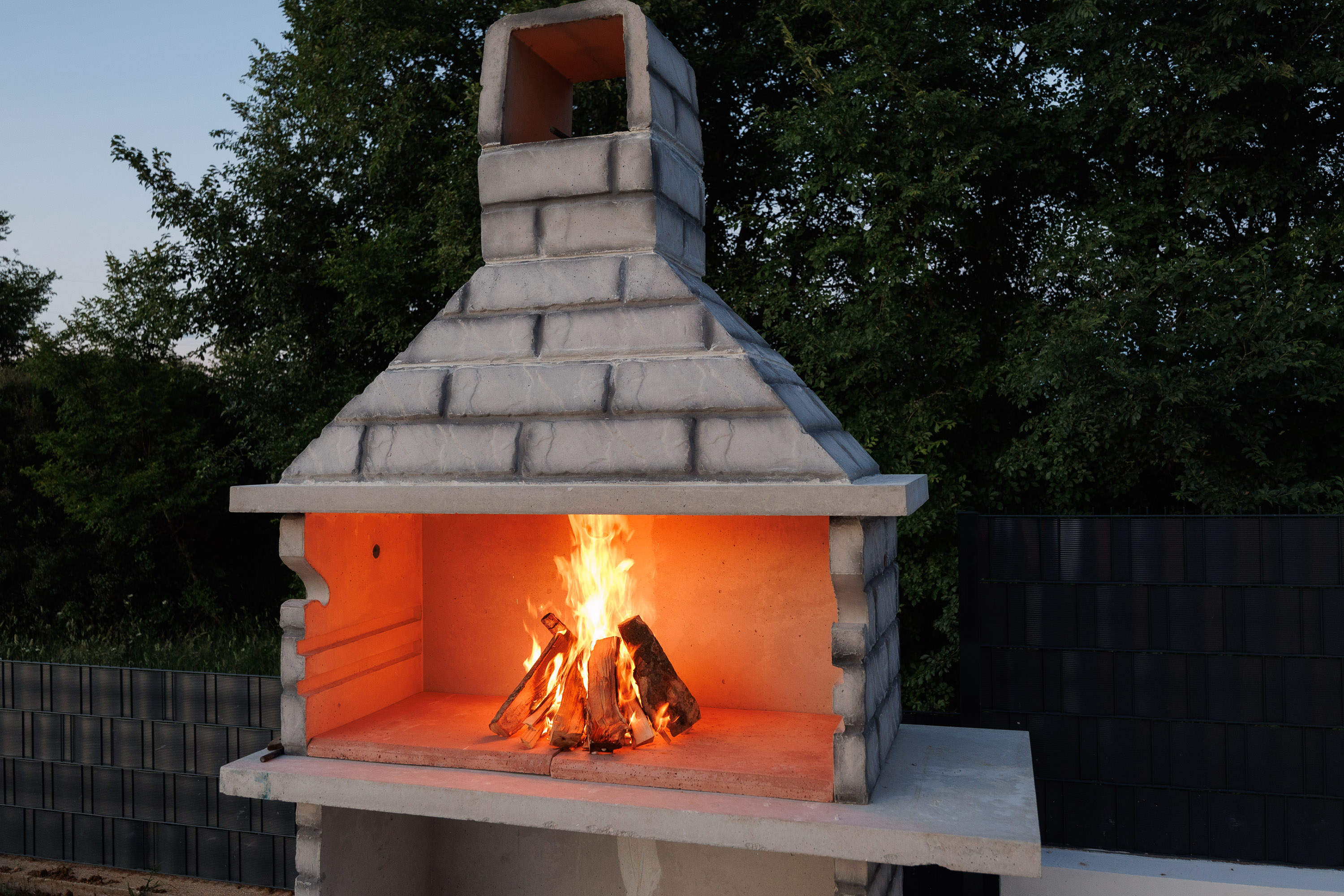 Outdoor fireplace with crackling fire